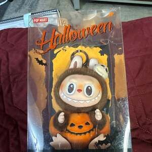 POP MART The Monsters Labubu Happy Halloween Party Series Sitting Pumpkin Vinyl